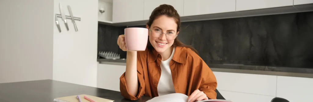 distance-learning-young-woman-home-student-studying-home-drinking-tea-reading-her-work